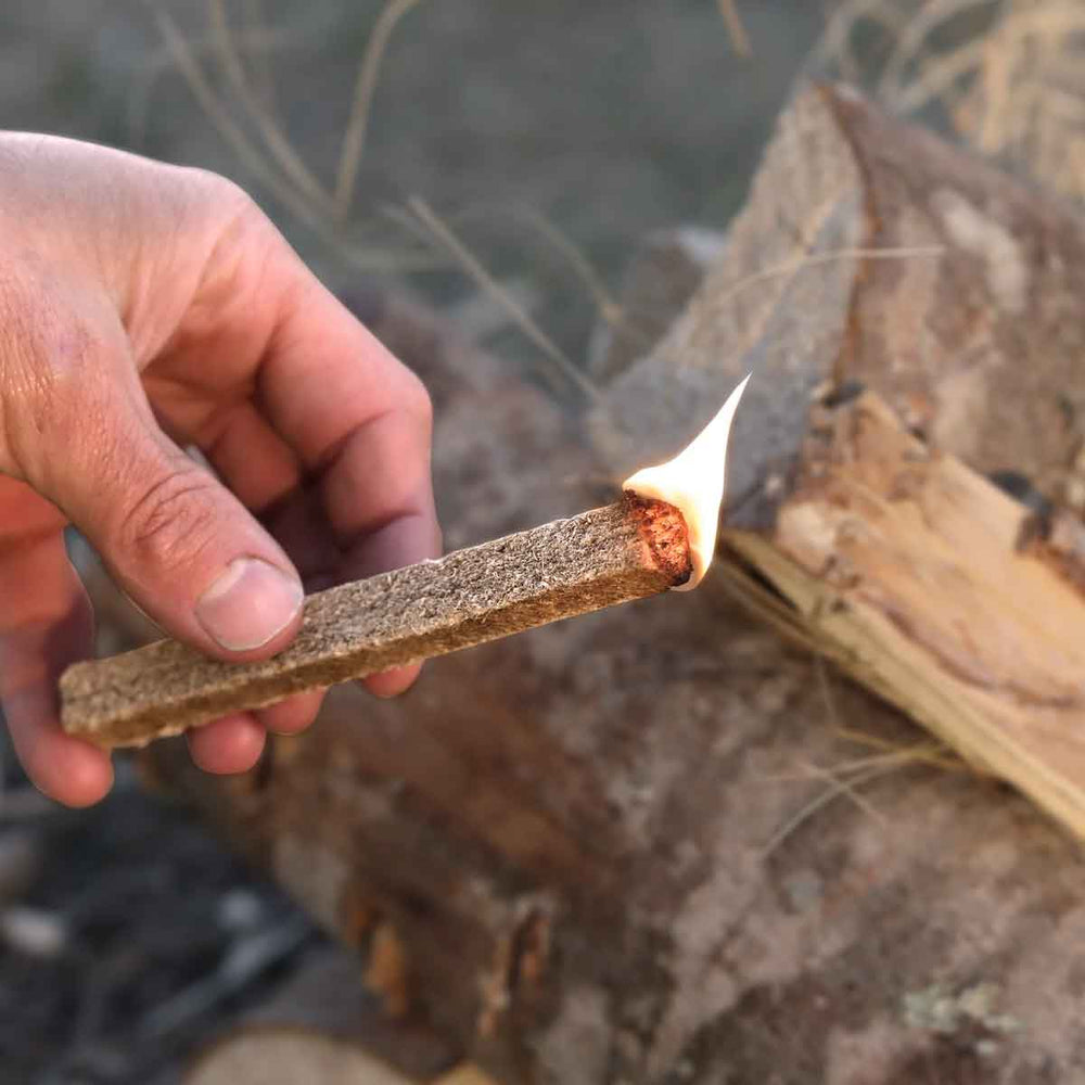 Fire sticks burning in a campfire setting